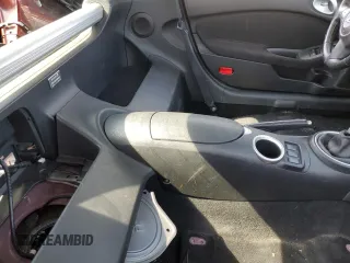 2013 Nissan 370Z Touring z VIN JN1AZ4EHXDM383169, wystawiony jako Copart lot #59787045 z przebiegiem 76 601 mil mil oraz Szkoda całkowita • Salvage title. Historia ofert i sprzedaży dostępna na DreamBid. Obrazek 10.