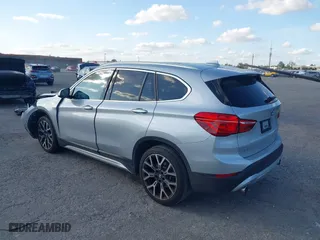 2020 BMW X1 sDrive28i with VIN WBXJG7C08L5R71214, listed as a IAAI auction lot 41514330 with 34,140 mi miles. Bid and sale history available at carsss.com. Image 3.
