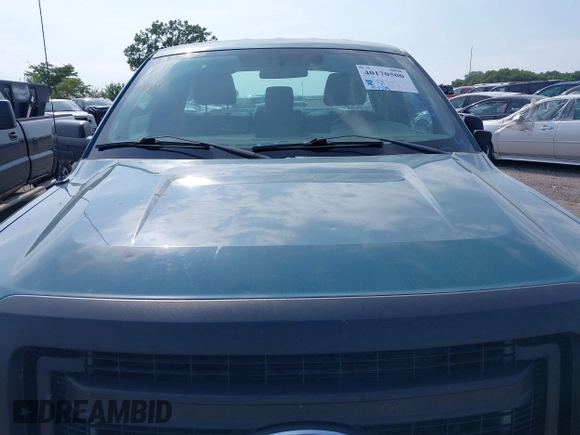 2013 Ford F-150 XL with VIN 1FTMF1CM8DKE57993, listed as a IAAI auction lot 40170500 with 195,379 mi miles and . Bid and sale history available at DreamBid. Image 6.