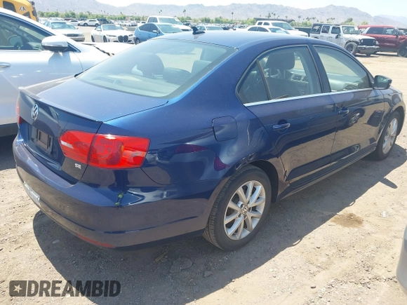 2014 Volkswagen Jetta SE z VIN 3VWD17AJ1EM303577, wystawiony jako IAAI lot #42436160 z przebiegiem 113 086 mil mil oraz . Historia ofert i sprzedaży dostępna na DreamBid. Obrazek 4.