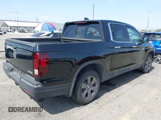 2020 Honda Ridgeline RTL-E with VIN 5FPYK3F70LB009376, listed as a IAAI auction lot 42488529 with 30,932 mi miles and . Bid and sale history available at DreamBid. Image 4.