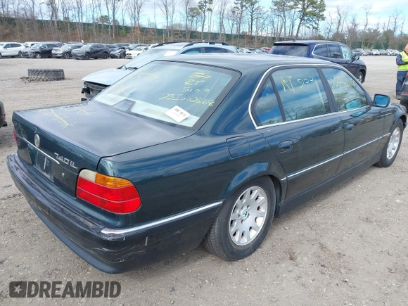 2000 BMW 7 Series 740iL with VIN WBAGH8343YDP13075, listed as a IAAI auction lot 42050589 with 999,999 mi miles. Bid and sale history available at carsss.com. Image 4.