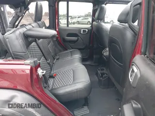 2021 Jeep Wrangler Unlimited Willys with VIN 1C4HJXDN5MW840857, listed as a IAAI auction lot 41885671 with 19,709 mi miles and . Bid and sale history available at DreamBid. Image 8.