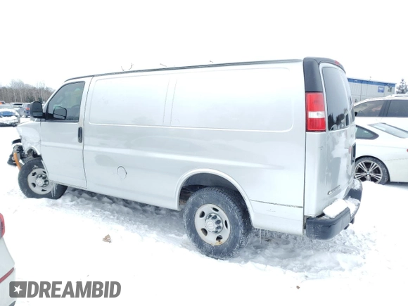 2020 Chevrolet Express Cargo Van with VIN 1GCWGAFG7L1125771, listed as a Copart auction lot 87446074 with 379,603 mi miles and Salvage Title. Bid and sale history available at carsss.com. Image 2.