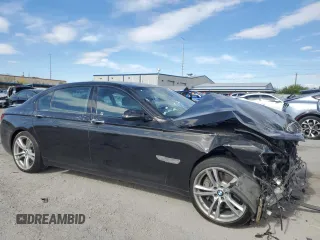 2015 BMW 7 Series 750Li with VIN WBAYE8C59FD781223, listed as a Copart auction lot 54944265 with 125,203 mi miles and Salvage title. Bid and sale history available at DreamBid. Image 4.