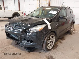 2016 Ford Escape Titanium with VIN 1FMCU0JX3GUB70607, listed as a IAAI auction lot 41727421 with 106,857 mi miles. Bid and sale history available at carsss.com. Image 12.
