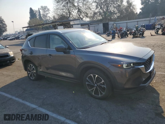 2023 Mazda CX-5 2.5 S Premium Plus Package with VIN JM3KFBEM6P0185977, listed as a Copart auction lot 87872585 with 28,568 mi miles and Salvage Title. Bid and sale history available at carsss.com. Image 4.