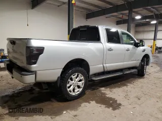 2016 Nissan Titan SL z VIN 1N6BA1F44GN510707, wystawiony jako Copart lot #57948665 z przebiegiem 89 723 mil mil oraz Tytuł czysty. Historia ofert i sprzedaży dostępna na DreamBid. Obrazek 3.
