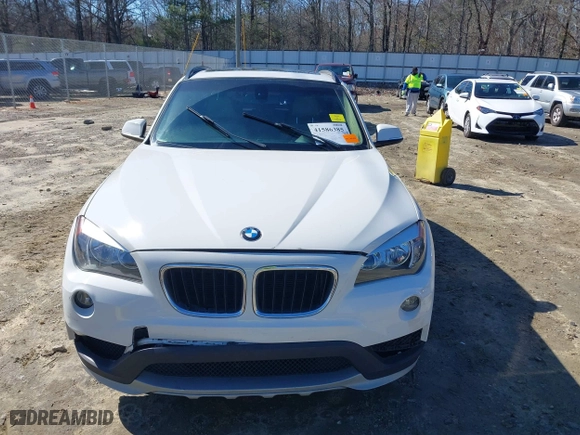 2015 BMW X1 sDrive28i with VIN WBAVM1C53FV317173, listed as a IAAI auction lot 41586385 with 146,068 mi miles. Bid and sale history available at carsss.com. Image 12.