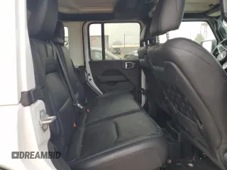 2023 Jeep Wrangler Rubicon z VIN 1C4JJXR6XPW663181, wystawiony jako Copart lot #49799125 z przebiegiem 8 085 mil mil oraz Szkoda całkowita • Salvage title. Historia ofert i sprzedaży dostępna na DreamBid. Obrazek 10.