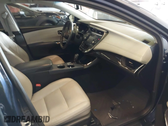 2014 Toyota Avalon Limited with VIN 4T1BK1EB1EU128987, listed as a IAAI auction lot 42034677 with 104,153 mi miles and . Bid and sale history available at DreamBid. Image 5.