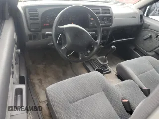2000 Nissan Frontier XE z VIN 1N6DD26S6YC415423, wystawiony jako Copart lot #59086535 z przebiegiem 122 746 mil mil oraz Szkoda całkowita • Salvage title. Historia ofert i sprzedaży dostępna na DreamBid. Obrazek 8.