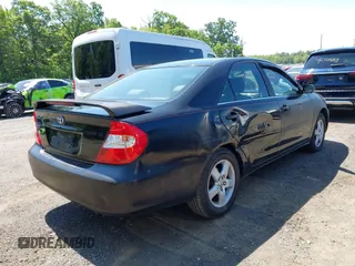 2002 Toyota Camry LE z VIN JTDBE32K020095947, wystawiony jako IAAI lot #42364984 z przebiegiem 198 756 mil mil oraz . Historia ofert i sprzedaży dostępna na DreamBid. Obrazek 4.
