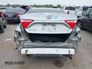 2015 Toyota Camry XLE with VIN 4T4BF1FKXFR472201, listed as a IAAI auction lot 41883944 with 143,296 mi miles and . Bid and sale history available at DreamBid. Image 6.