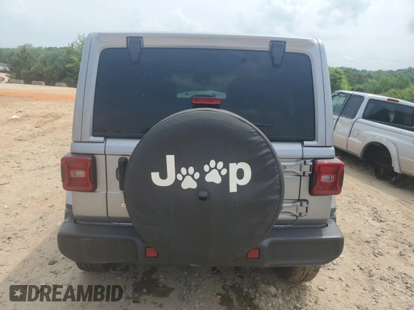 2020 Jeep Wrangler Unlimited Sahara Altitude with VIN 1C4HJXEN7LW134325, listed as a Copart auction lot 53860745 with 64,556 mi miles and Salvage title. Bid and sale history available at DreamBid. Image 6.