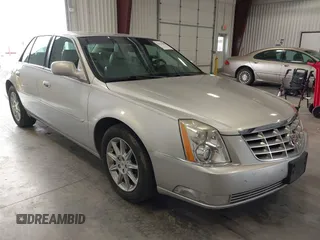 2011 Cadillac DTS Luxury Collection z VIN 1G6KD5E66BU119869, wystawiony jako IAAI lot #42221509 z przebiegiem 92 478 mil mil oraz . Historia ofert i sprzedaży dostępna na DreamBid. Obrazek 1.