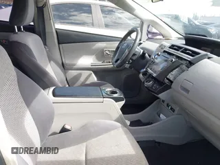2017 Toyota Prius v Two with VIN JTDZN3EU6HJ057203, listed as a IAAI auction lot 41544512 with 116,663 mi miles. Bid and sale history available at carsss.com. Image 5.