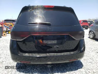 2014 Honda Odyssey Touring with VIN 5FNRL5H97EB016624, listed as a Copart auction lot 53444645 with 244,126 mi miles and Salvage Title. Bid and sale history available at DreamBid. Image 6.