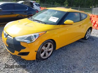 2012 Hyundai Veloster w/Gray Int with VIN KMHTC6AD2CU079902, listed as a IAAI auction lot 42088473 with 143,983 mi miles. Bid and sale history available at carsss.com. Image 2.