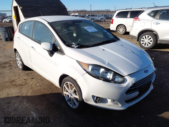 2019 Ford Fiesta SE z VIN 3FADP4EJ0KM148306, wystawiony jako IAAI lot #41666170 z przebiegiem 68 966 mil mil oraz . Historia ofert i sprzedaży dostępna na DreamBid. Obrazek 1.