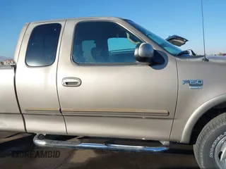 2001 Ford F-150 XL with VIN 1FTRX18L31NA75349, listed as a IAAI auction lot 40921255 with 165,872 mi miles. Bid and sale history available at carsss.com. Image 13.
