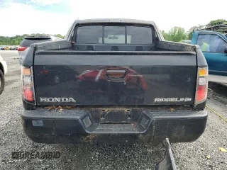 2006 Honda Ridgeline RTL z VIN 2HJYK16586H512708, wystawiony jako Copart lot #59264995 z przebiegiem 208 913 mil mil oraz Tytuł czysty. Historia ofert i sprzedaży dostępna na DreamBid. Obrazek 6.