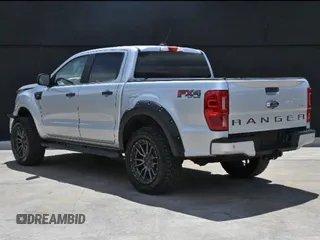 2019 Ford Ranger XL with VIN 1FTER4FH5KLA29401, listed as a Copart auction lot 64990365 with 98,143 mi miles and Salvage title. Bid and sale history available at DreamBid. Image 3.