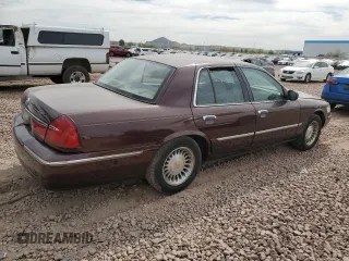 2001 Mercury Grand Marquis LS с VIN 2MEFM75W81X667940, выставлен на аукционе Copart как лот 48027015 с пробегом 121 967 миль миль и Списание • Salvage title. История ставок и продаж доступна на DreamBid. Изображение 3.