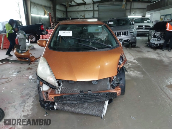 2009 Honda Fit Sport with VIN JHMGE88469S069328, listed as a IAAI auction lot 41464558 with 219,541 mi miles. Bid and sale history available at carsss.com. Image 12.
