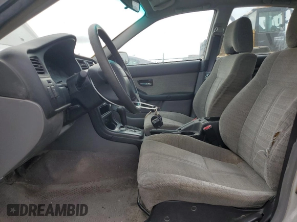 2002 Subaru Legacy L with VIN 4S3BE635727213302, listed as a Copart auction lot 58575235 with 243,886 mi miles and Salvage title. Bid and sale history available at DreamBid. Image 7.
