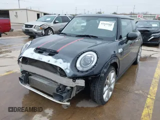 2014 MINI Hardtop S with VIN WMWXM7C56ET926604, listed as a IAAI auction lot 41642560 with 81,219 mi miles and . Bid and sale history available at DreamBid. Image 18.
