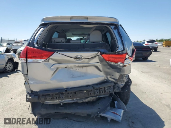 2014 Toyota Sienna XLE with VIN 5TDYK3DCXES496657, listed as a Copart auction lot 60498015 with 178,486 mi miles and Salvage title. Bid and sale history available at DreamBid. Image 6.