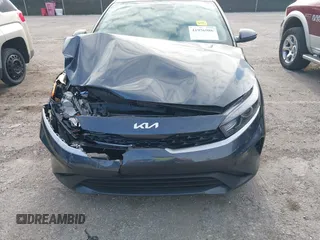 2024 Kia Forte LXS with VIN 3KPF24AD5RE720735, listed as a IAAI auction lot 41956986 with 27,967 mi miles and . Bid and sale history available at DreamBid. Image 6.