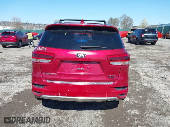 2016 Kia Sorento SX z VIN 5XYPKDA55GG113859, wystawiony jako IAAI lot #41937491 z przebiegiem 91 999 mil mil oraz . Historia ofert i sprzedaży dostępna na DreamBid. Obrazek 17.