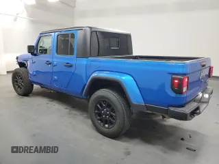 2023 Jeep Gladiator Overland z VIN 1C6HJTFG6PL564337, wystawiony jako Copart lot #59620315 z przebiegiem 31 552 mil mil oraz Czysty tytuł • Clean title. Historia ofert i sprzedaży dostępna na DreamBid. Obrazek 2.