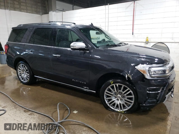 2022 Ford Expedition Platinum with VIN 1FMJU1MTXNEA47383, listed as a Copart auction lot 87005364 with 28,696 mi miles and Salvage title. Bid and sale history available at DreamBid. Image 4.