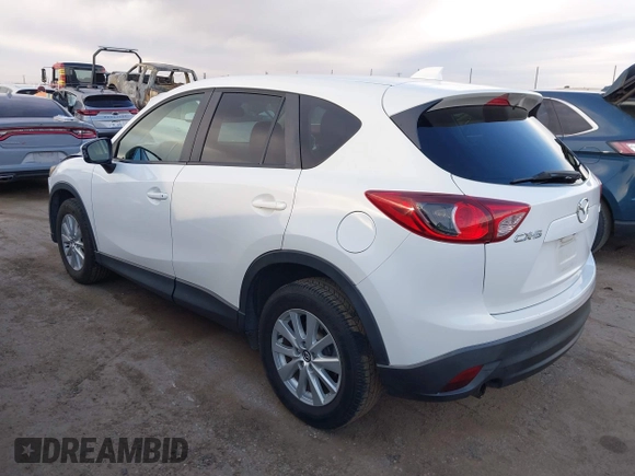 2014 Mazda CX-5 Touring with VIN JM3KE2CY8E0321578, listed as a IAAI auction lot 41769930 with 101,724 mi miles. Bid and sale history available at carsss.com. Image 3.