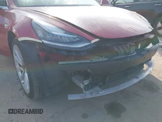 2018 Tesla Model 3 Long Range Battery with VIN 5YJ3E1EA8JF047298, listed as a IAAI auction lot 41403507 with 172,142 mi miles and . Bid and sale history available at DreamBid. Image 19.
