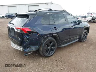 2021 Toyota RAV4 Hybrid XSE with VIN 4T3E6RFV0MU053245, listed as a IAAI auction lot 42426959 with 28,717 mi miles and . Bid and sale history available at DreamBid. Image 4.