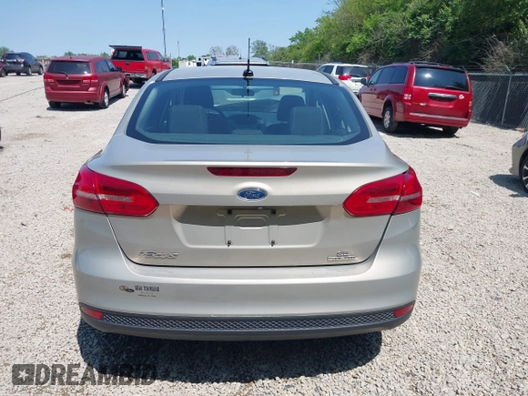 2015 Ford Focus SE z VIN 1FADP3F27FL376151, wystawiony jako IAAI lot #42388275 z przebiegiem 138 947 mil mil oraz . Historia ofert i sprzedaży dostępna na DreamBid. Obrazek 17.