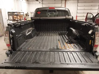 2013 Toyota Tacoma with VIN 3TMMU4FN9DM052987, listed as a IAAI auction lot 42325979 with 200,379 mi miles and . Bid and sale history available at DreamBid. Image 17.