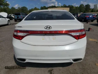 2014 Hyundai Azera с VIN KMHFG4JG0EA352016, выставлен на аукционе Copart как лот 51609895 с пробегом 186 157 миль миль и Чистый • Clean title. История ставок и продаж доступна на DreamBid. Изображение 6.