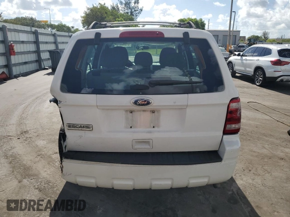2011 Ford Escape XLS with VIN 1FMCU9C71BKC08406, listed as a Copart auction lot 61359975 with 182,954 mi miles and Salvage title. Bid and sale history available at DreamBid. Image 6.