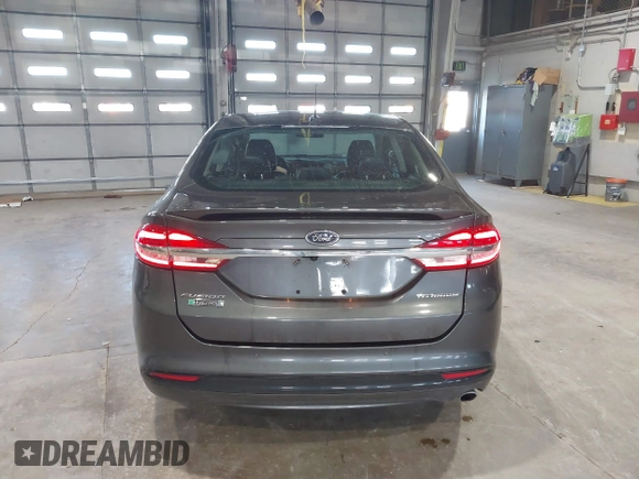 2017 Ford Fusion Titanium with VIN 3FA6P0SU2HR162865, listed as a IAAI auction lot 41981344 with 79,618 mi miles and . Bid and sale history available at DreamBid. Image 16.
