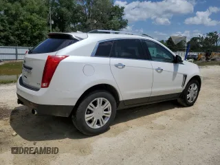 2014 Cadillac SRX Luxury Collection z VIN 3GYFNBE30ES685072, wystawiony jako Copart lot #58122705 z przebiegiem 128 013 mil mil oraz Szkoda całkowita • Salvage title. Historia ofert i sprzedaży dostępna na DreamBid. Obrazek 3.