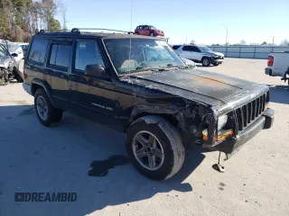 2000 Jeep Cherokee Classic with VIN 1J4FF58S3YL171454, listed as a Copart auction lot 42945485 with 218,721 mi miles and Salvage Title. Bid and sale history available at carsss.com. Image 4.