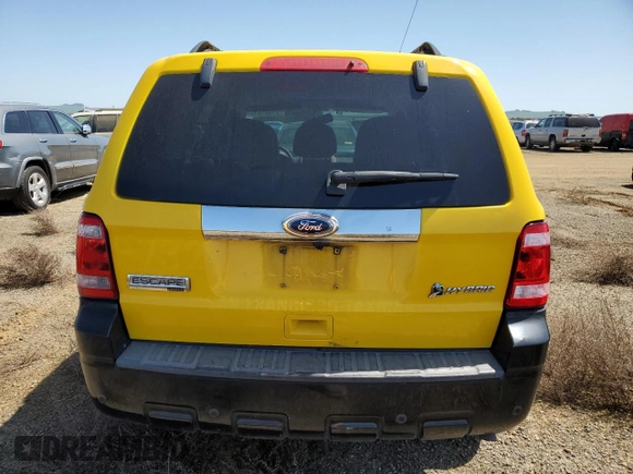 2010 Ford Escape Hybrid with VIN 1FMCU4K38AKB66672, listed as a Copart auction lot 51331815 with 371,313 mi miles and Salvage title. Bid and sale history available at DreamBid. Image 6.