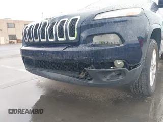 2015 Jeep Cherokee Latitude with VIN 1C4PJMCS2FW538575, listed as a IAAI auction lot 41799474 with 88,197 mi miles and . Bid and sale history available at DreamBid. Image 17.