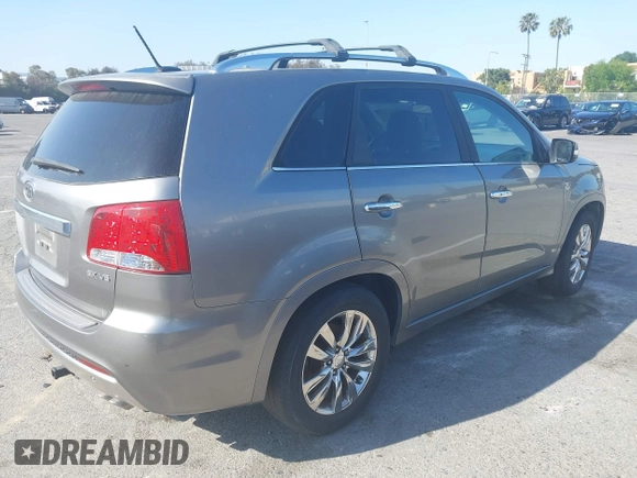 2012 Kia Sorento SX with VIN 5XYKW4A23CG241547, listed as a IAAI auction lot 41939973 with 135,986 mi miles. Bid and sale history available at carsss.com. Image 4.