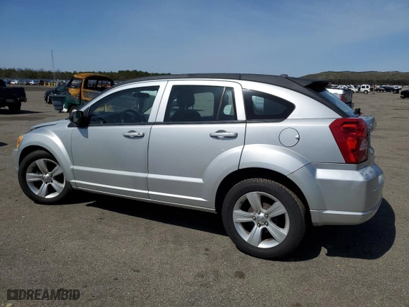 2010 Dodge Caliber SXT with VIN 1B3CB4HA6AD540167, listed as a Copart auction lot 51073465 with 81,148 mi miles and Salvage Title. Bid and sale history available at carsss.com. Image 2.